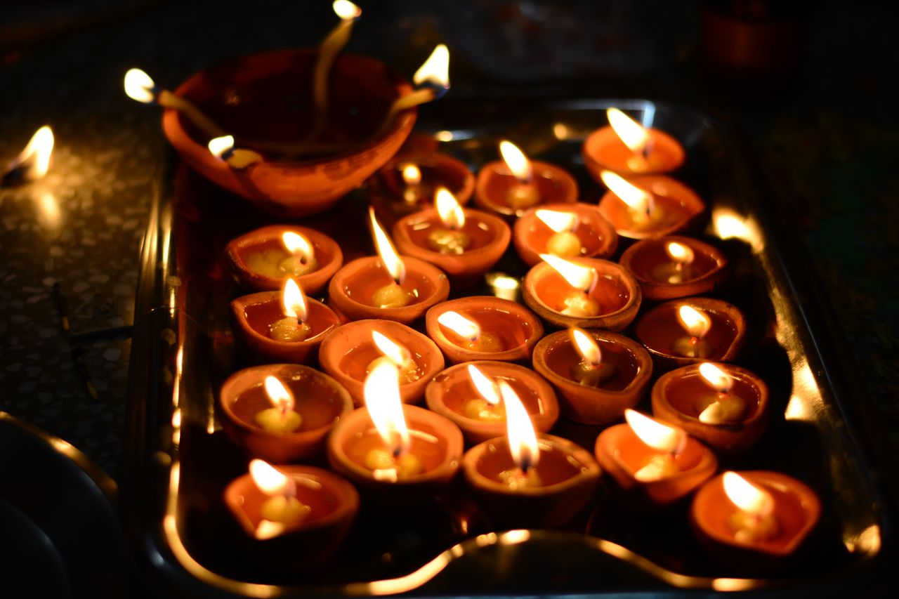 Diwali diyas glowing at night
